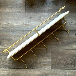 Gold coat hooks with shelf